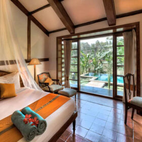 evolve-back-coorg-lilly-pool-bungalow-bedroom-500×500