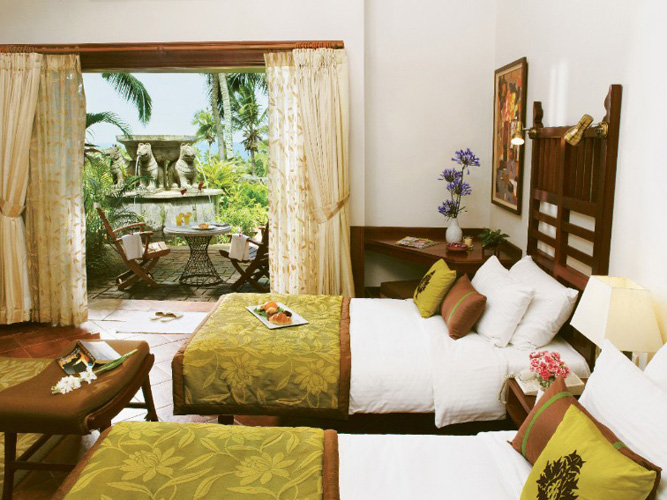taj-green-cove-resort-bedroom-with-garden-view-500×500